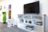 Ferienwohnung in Großenbrode - Meerblickvilla 21 - Wohnzimmer Fernseher